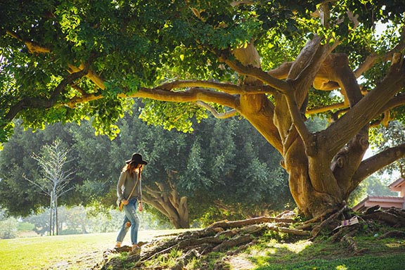 woman by tree